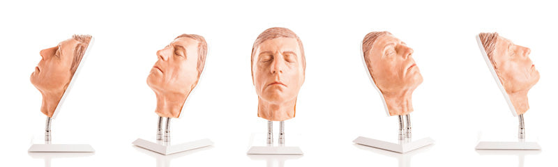 Model af en mands ansigt til træning i injektion