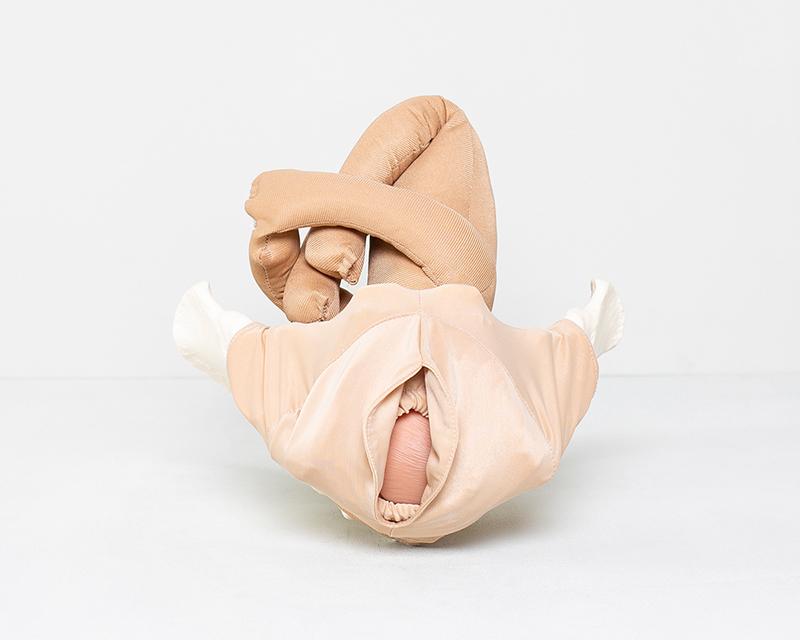 Praktisk model af bækkenbunden i stof målrettet demonstration af udvidelsen af vagina ved fødslen