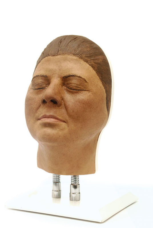Model af en kvindes ansigt til træning i injektion