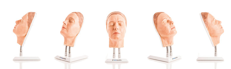 Modell av en kvinnas ansikte för injektionsträning